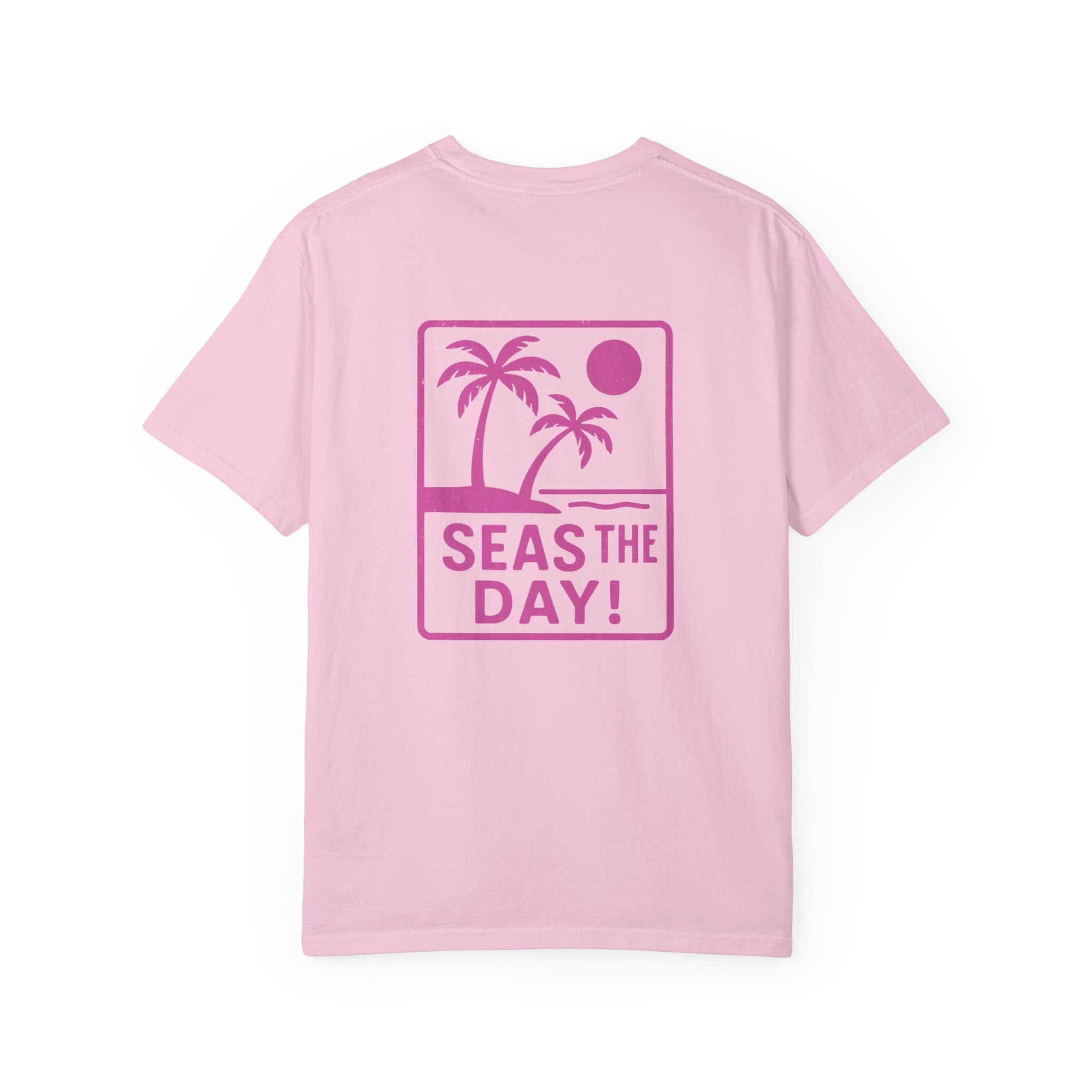 Pink t-shirt with palm tree design and 'SEAS THE DAY!' text on a white background