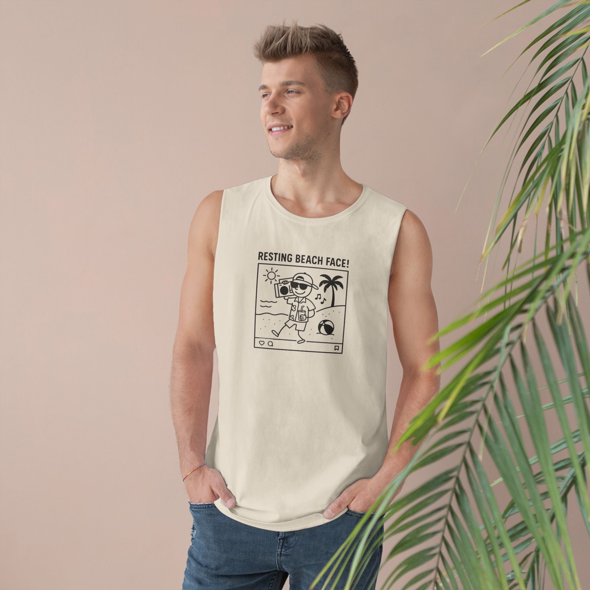 Man wearing a sleeveless shirt with a graphic design against a beige background